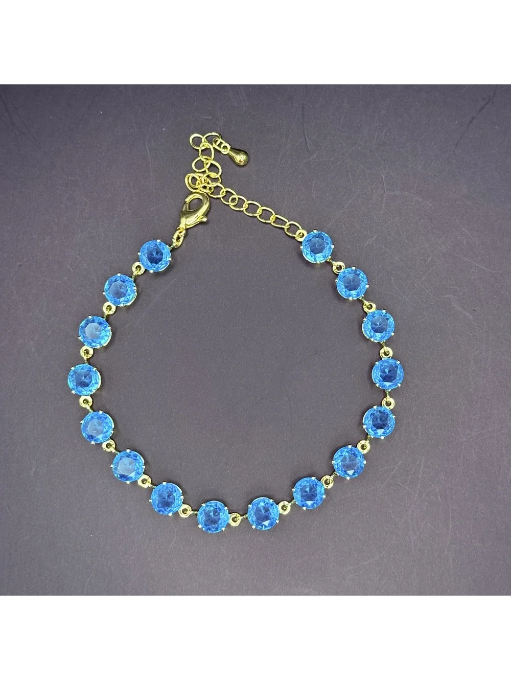 candy+clover Aqua Blue Crystal Gold-Tone Bracelet